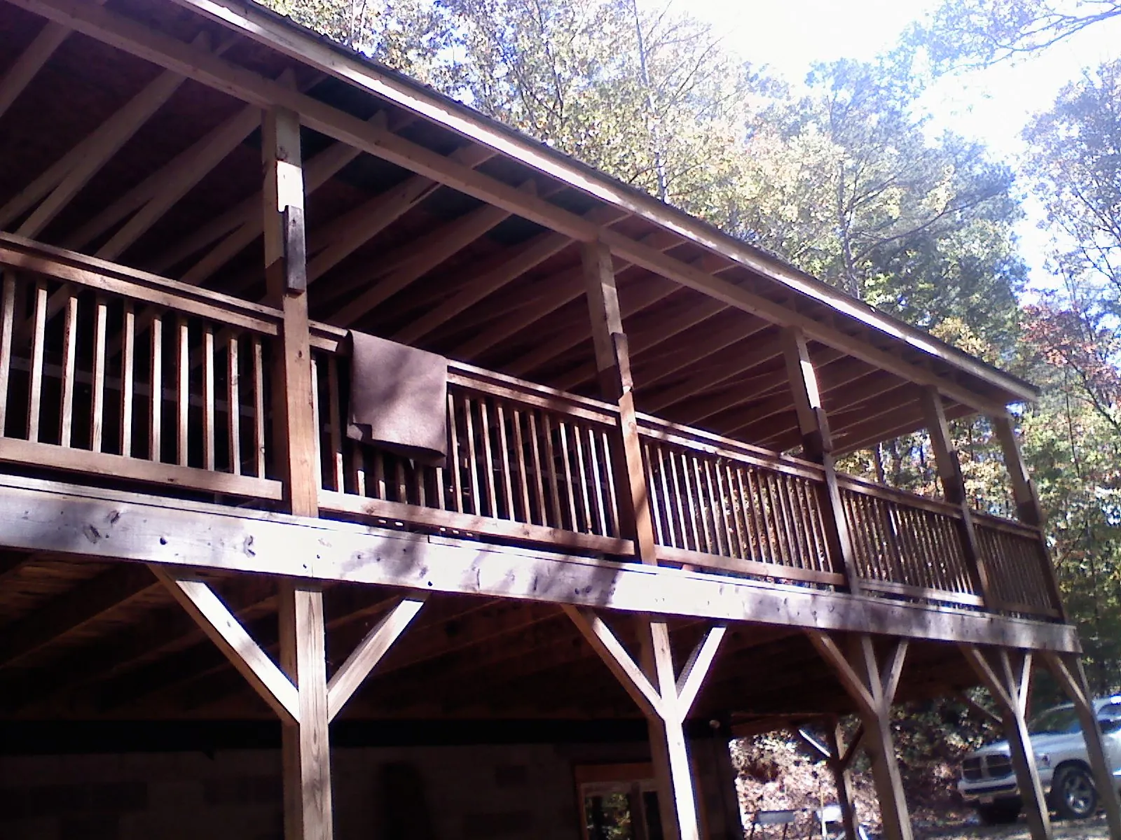Timber framing under a new elevated porch and deck — Roof Leak Repair in Ashland by Roofing Brothers